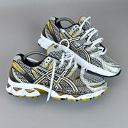 ASICS Gel Nimbus 16 - Blanc / Or - Sneykers